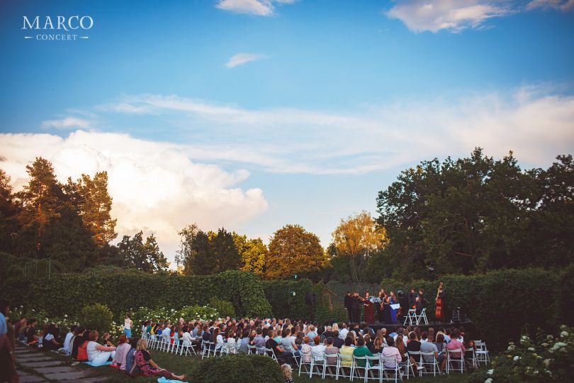 People listening to soul in a park